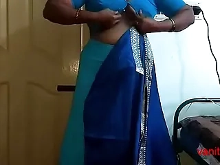 desi Indian  tamil aunty telugu aunty kannada aunty  malayalam aunty Kerala aunty hindi bhabhi gung-ho cheating wife vanitha debilitating saree showing big gut and shaved honeypot Aunty Changing Dress ready for party and Making Video